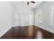 Bright and airy bedroom featuring large windows and beautiful hardwood floors with ample natural light at 2810 N Jefferson St, Tampa, FL 33602