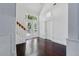Bright living space with wood floors, high ceilings, and double French doors to deck at 2810 N Jefferson St, Tampa, FL 33602