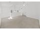 Open loft space with high ceilings, ceiling fans and ample room for entertaining or relaxing at 315 Wooten Rd, Lutz, FL 33548