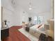 Spacious main bedroom features hardwood floors, a fan, and a door to a small balcony at 315 Wooten Rd, Lutz, FL 33548