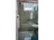 Bathroom featuring original style tile and shower-tub combo at 3436 100Th N Ave, Pinellas Park, FL 33782