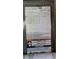 HVAC control panel with equipment specifications and safety warnings at 3436 100Th N Ave, Pinellas Park, FL 33782