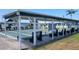 Outdoor shuffleboard courts with benches, providing recreational opportunities for residents at 3436 100Th N Ave, Pinellas Park, FL 33782