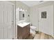 Well-lit bathroom with modern vanity, toilet, and stylish decor at 3908 N Forbes Rd, Plant City, FL 33565