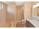 Well-lit bathroom features a combined shower-tub and modern vanity at 3908 N Forbes Rd, Plant City, FL 33565