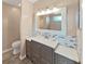 Bathroom with modern vanity, fixtures, and decorative mosaic tile backsplash at 3908 N Forbes Rd, Plant City, FL 33565