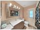 Updated bathroom with modern vanity, fixtures, and contemporary style at 3908 N Forbes Rd, Plant City, FL 33565