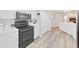 Well-appointed kitchen with stainless steel appliances and white cabinets, offers a modern cooking space at 3908 N Forbes Rd, Plant City, FL 33565