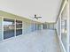 Expansive covered patio with multiple access points and plenty of room for entertaining at 3908 N Forbes Rd, Plant City, FL 33565