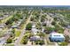 An aerial view pinpoints the location of this property in a neighborhood with mature trees and winding streets at 4091 Cherry Ne St, St Petersburg, FL 33703