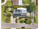 Aerial shot of house with solar panels, meticulous landscaping, and a private backyard hot tub at 4091 Cherry Ne St, St Petersburg, FL 33703