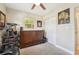 Bedroom featuring a modern murphy bed and chair with natural light from the window and ample closet space at 4091 Cherry Ne St, St Petersburg, FL 33703