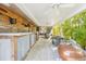 Spacious outdoor area with a bar, grill, and seating, great for entertaining and enjoying the outdoors at 4091 Cherry Ne St, St Petersburg, FL 33703