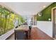 Expansive screened patio with dining and lounge areas, offering a seamless indoor-outdoor living experience at 4091 Cherry Ne St, St Petersburg, FL 33703