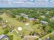 This aerial shot captures a beautiful property in a lush, golf-course-adjacent community at 4212 Fairway Cir, Tampa, FL 33618