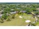 Aerial view of a well-maintained community near a golf course, showcasing lush green surroundings at 4212 Fairway Cir, Tampa, FL 33618