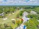 Overhead shot of a condo community bordering a golf course and lush landscaping at 4212 Fairway Cir, Tampa, FL 33618