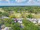 Aerial view of a condo community on a golf course surrounded by trees at 4212 Fairway Cir, Tampa, FL 33618