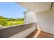 Balcony with beautiful views of a golf course and blue skies at 4212 Fairway Cir, Tampa, FL 33618