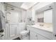 Clean and accessible bathroom featuring a walk-in tub, vanity, and modern fixtures for a comfortable experience at 4212 Fairway Cir, Tampa, FL 33618
