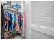 Spacious walk-in closet with ample storage, shelving, and hanging space for organized clothing and accessories at 4212 Fairway Cir, Tampa, FL 33618