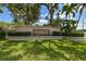 A sign for Southfield sits atop manicured landscaping and green grass at 4645 Meadowview Cir, Sarasota, FL 34233