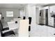 Open layout featuring the dining and living spaces and kitchen at 5118 Tennis Court Circle, Tampa, FL 33617