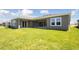 Large backyard and green lawn at 5152 Wildwind Dr, Apollo Beach, FL 33572