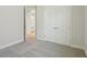 Bedroom with carpet and a view to a bathroom with dual sinks at 5152 Wildwind Dr, Apollo Beach, FL 33572