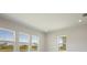 Bright living room featuring a view of the lake at 5152 Wildwind Dr, Apollo Beach, FL 33572