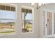 Bright living room with large windows and a view of the outdoors at 5152 Wildwind Dr, Apollo Beach, FL 33572