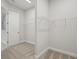 Empty walk-in closet with shelving at 5152 Wildwind Dr, Apollo Beach, FL 33572