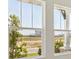 View from modern windows overlooking the neighborhood landscape at 5152 Wildwind Dr, Apollo Beach, FL 33572