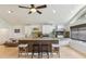 Bright and airy kitchen featuring a large island, built-in grill, and seating at 5335 Sand Crane Ct, Wesley Chapel, FL 33543