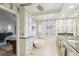 An impressive ensuite bathroom with tub, lots of light, and designer finishes at 5335 Sand Crane Ct, Wesley Chapel, FL 33543