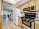 Convenient kitchen flows into the dining and living areas, creating an open and social atmosphere at 5890 38Th N Ave # 305, St Petersburg, FL 33710
