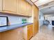 Efficient kitchen with ample storage, a picture window, and easy access to adjacent living areas at 5890 38Th N Ave # 305, St Petersburg, FL 33710
