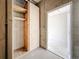 Indoor storage room featuring wood and cement walls and a door leading to a utility closet at 5890 38Th N Ave # 305, St Petersburg, FL 33710