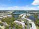 Breathtaking aerial view of waterfront property with lush greenery, lakes and easy access to amenities and recreation at 6205 Shoreline Dr # 1204, St Petersburg, FL 33708