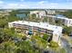 Beautiful aerial view highlights the architectural details, balconies, and well-manicured grounds of this community at 6205 Shoreline Dr # 1204, St Petersburg, FL 33708