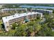 Expansive aerial view showcases the community's layout, lush greenery, and convenient access to amenities and recreation at 6205 Shoreline Dr # 1204, St Petersburg, FL 33708