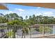 Balcony with views of lush palm trees, and tropical landscaping at 6205 Shoreline Dr # 1204, St Petersburg, FL 33708