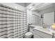 Well-lit bathroom with modern fixtures, a shower and stylish decor at 6205 Shoreline Dr # 1204, St Petersburg, FL 33708