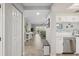 Bright hallway with stylish tile flooring leading into the well-lit living area at 6205 Shoreline Dr # 1204, St Petersburg, FL 33708