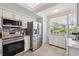 Well-equipped kitchen featuring stainless steel appliances and ample storage at 6205 Shoreline Dr # 1204, St Petersburg, FL 33708