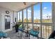 Relaxing lanai with cozy chairs and scenic views of the surrounding landscape at 6205 Shoreline Dr # 1204, St Petersburg, FL 33708
