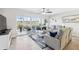 Inviting living room with a view to the screened patio, comfortable seating, and stylish decor, creating a relaxing atmosphere at 6205 Shoreline Dr # 1204, St Petersburg, FL 33708