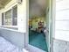 Inviting entryway showcases the home's interior with a view into the living area at 6350 55Th N Ave, St Petersburg, FL 33709