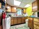Functional kitchen boasts ample cabinet space and an efficient design at 6350 55Th N Ave, St Petersburg, FL 33709