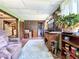 Inviting sun room with casual furnishings, views of the backyard, and bright natural light at 6350 55Th N Ave, St Petersburg, FL 33709
